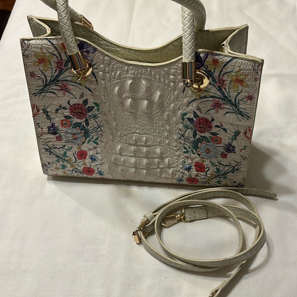 Cream With Floral Detail Handbag includes Crossbody strap.